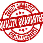 76081932 garantie de qualité ronde grunge timbre rouge